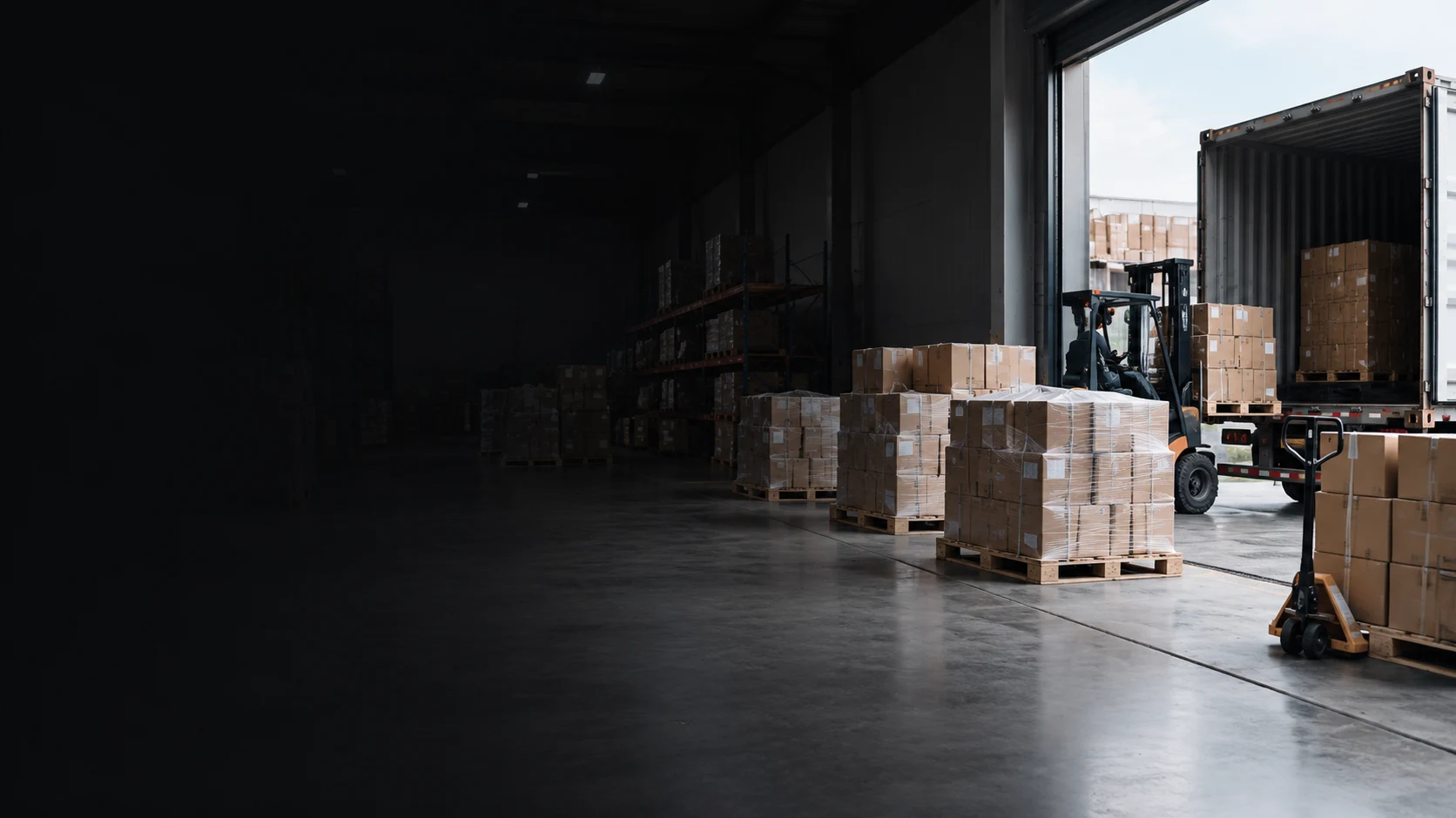 Palletized export shipments prepared at a loading bay